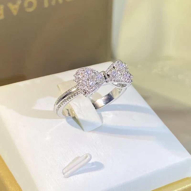 Fancy Bow Ring met oogverblind - Tie Clip Silver recensie en prijs